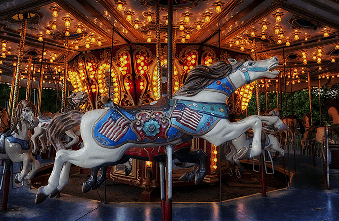 A photograph of a horse carousel. 