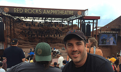 A photograph of Forrest Dombrow at Red Rocks Amphitheatre. 