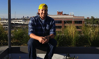 A photograph of Shaun Elley on a Denver rooftop.