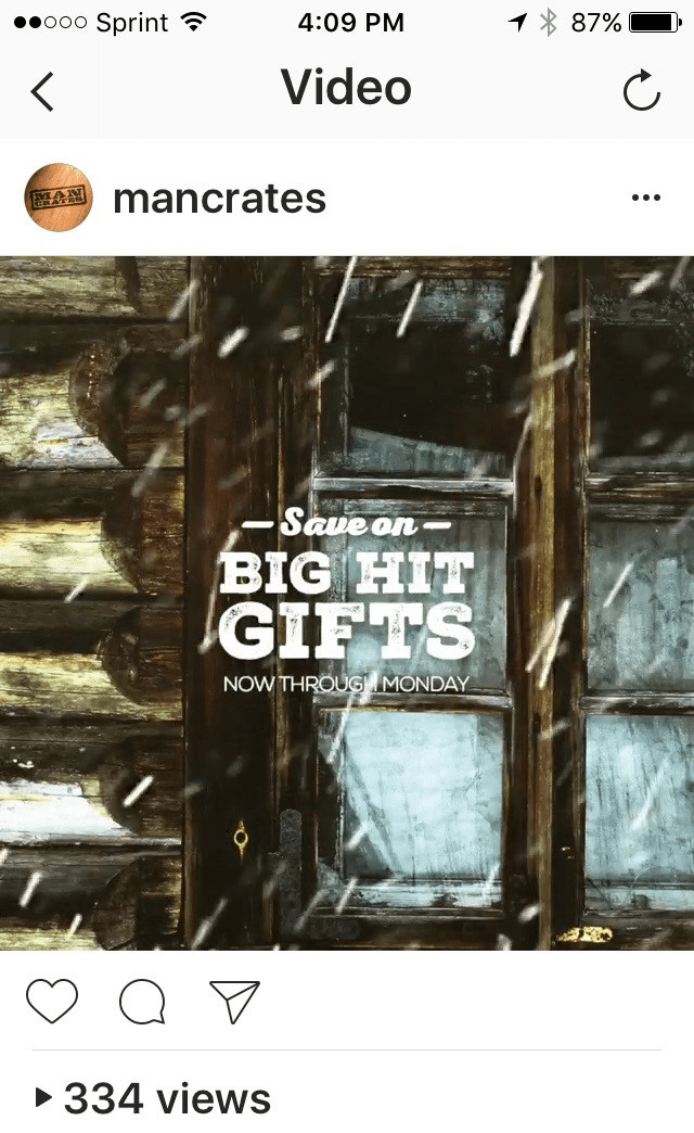 Mancrates Instagram video still. An illustration of snow falling in front of a log cabin. Text over the illustration states: Save on Big Hit Gifts now through Monday. 