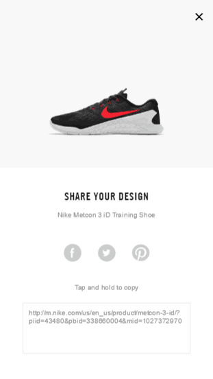 Nike mobile Share your design page. A photograph of a sneaker. Below are three icons: Facebook, Twitter and Pinterest. Following is a textbox containing a link labeled "Tap and hold to copy." 