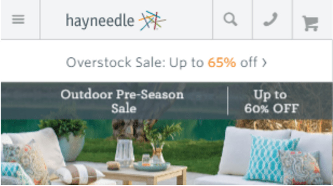 Hayneedle mobile page. In the top banner on the right are three icons: search, phone and shopping cart. 