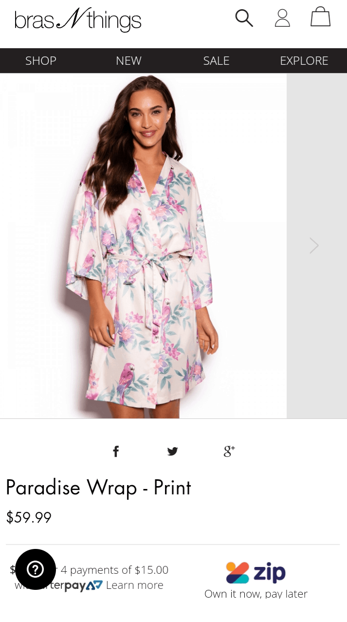 BrasNThings Mobile Screenshot Bras N Things Mobile Product detail Screenshot. A photograph of a model wearing a wrap. Below, title of the wrap and price. Below a question mark icon is located over text.