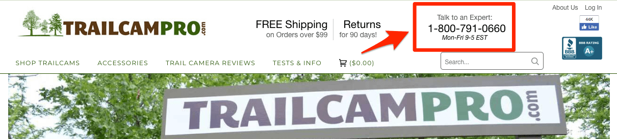 TrailCamPro homepage screenshot. At the top of the page text states: "Talk to an Expert," followed by a phone number and available times. 