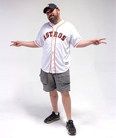 Mike Belasco wearing an Astros team shirt.