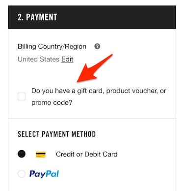 Mobile payment screenshot. An arrow points to a check box labeled Do you have a gift card, product voucher, or promo code?