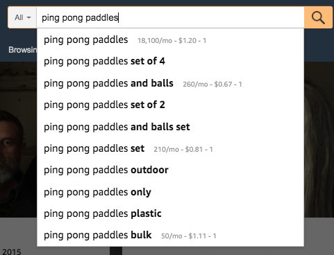 Amazon search bar screenshot for ping pong paddles. The search bar extends to display nine suggestions all beginning with ping pong paddles as follows: set of 4, and balls, set of 2, and balls set, set, outdoor, only, plastic, bulk. 