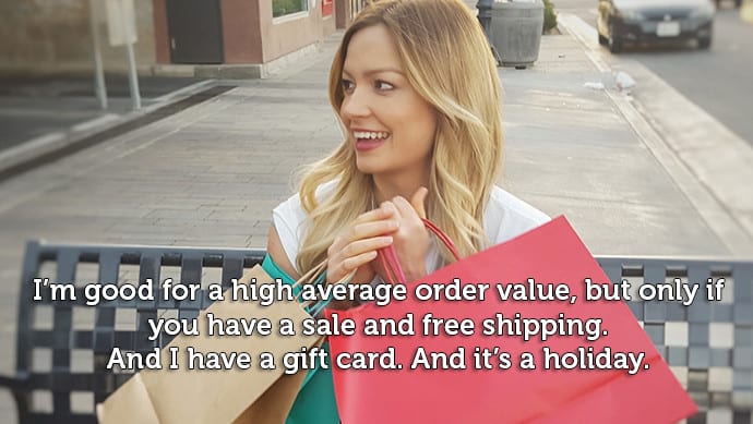 A photograph of a smiling woman sitting on a bench holding shopping bags. Text states: I'm good for a high average order value, but only if you have a sale and free shipping. And I have a gift card. And it's a holiday. 