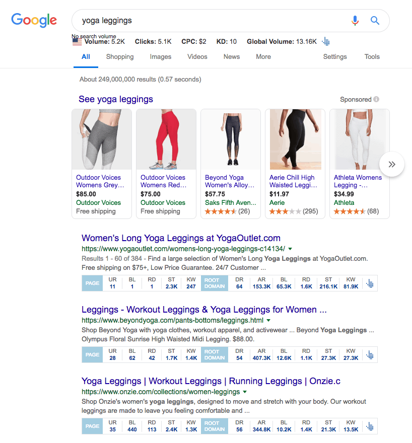 Google search result for yoga leggings. Top 3 search results are displayed. Each search result is followed by a table with metrics as follows Search result 1 (yogaoutlet.com): Page: U R: 11, B L: 1, R D: 1, S T: 2.3 K, K W: 247. Root Domain: D R: 64, A R: 153.3 K, B L: 65.3 K, R D: 1.6 K, S T: 216.1 K, K W: 81.9 K. Search result 2 (beyondyoga.com): Page: U R: 28, B L: 62, R D: 42, S T: 1.7 K, K W: 1.4 K. Root Domain: D R: 54, A R: 407.3 K, B L: 12.6 K, R D: 1.1 K, S T: 27.3 K, K W: 27.3 K. Search result 3 (onzie.com): Page: U R: 35, B L: 440, R D: 113, S T: 2.4 K, K W: 1.3 K. Root Domain: D R: 56, A R: 344.8 K, B L: 10.2 K, R D: 1.4 K, S T: 21.3 K, K W: 13.5 K.