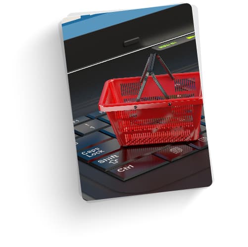inflow_SEO-process_eCommerce-SEO A photograph of a small toy shopping cart on a keyboard.