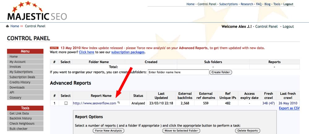 Majestic S E O Control panel screenshot. A table at the center is titled Advanced Reports. Under the column Report name, an arrow points at a U R L. 