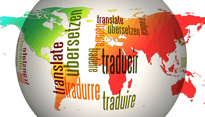 An illustration of a globe with the word "translate" translated in different languages. 