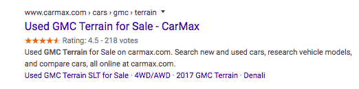 A Google search result for CarMax. The title of the page is followed by a rating along with the number of votes. 