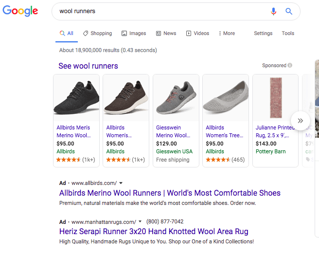 Google search results for wool runners. Text at the top of the results states: See wool runners. Beneath is a horizontal row of products with an image of the product, name, price, website and rating with the option to scroll. Three of the first four results are for the Allbirds brand. Beneath, the first Ad text result is Allbirds.  