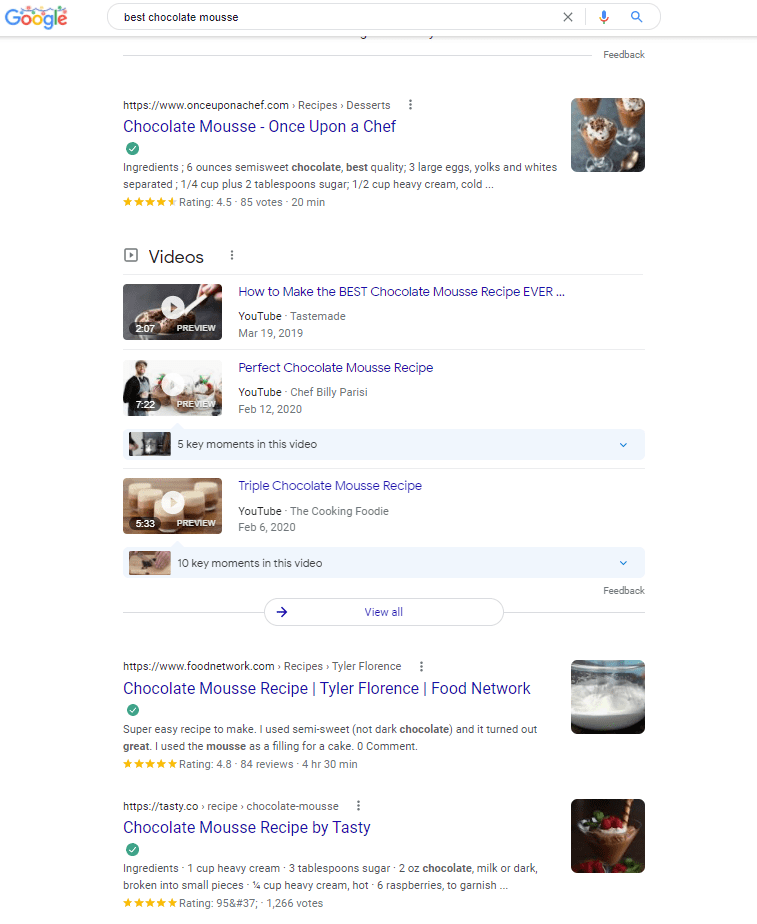 Google SERP results for "best cocoa  mousse," showing integrated  look    result, video cards with apical  cardinal  moments, and different   integrated  look    results.