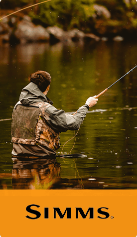 Photo of a fisherman fishing in the water.