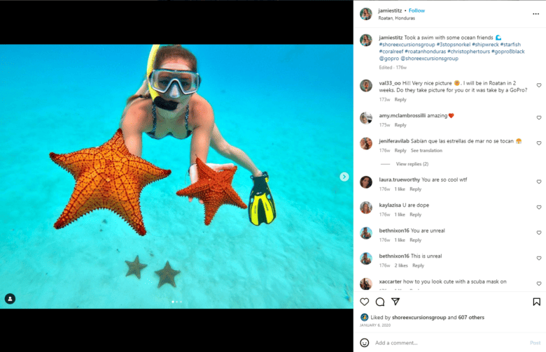 Instagram post of a woman snorkling and holding two starfish in her hands. Caption: Took a swim with some ocean friends.