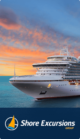 Cruise ship on an open sea with a sunset.